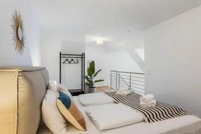 Ein Bett oder Betten in einem Zimmer der Unterkunft Hillside Living Vienna