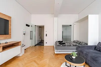 Ein Sitzbereich in der Unterkunft Black & White Apartment