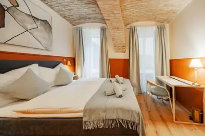 Ein Bett oder Betten in einem Zimmer der Unterkunft HOME1 - Das Kopernikus