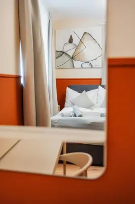 Ein Bett oder Betten in einem Zimmer der Unterkunft HOME1 - Das Kopernikus