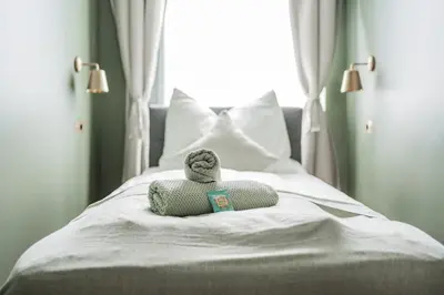 Ein Bett oder Betten in einem Zimmer der Unterkunft HOME1 - Douzième Boutique Hostel