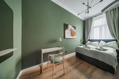 Ein Bett oder Betten in einem Zimmer der Unterkunft HOME1 - Douzième Boutique Hostel