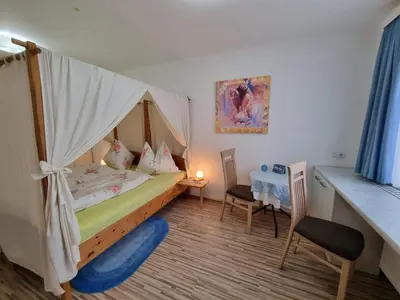 Ein Bett oder Betten in einem Zimmer der Unterkunft Hotel Sananda-Farm