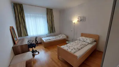 Ein Bett oder Betten in einem Zimmer der Unterkunft Wohnung Simmering neben U&S-Bahn