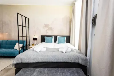 Ein Bett oder Betten in einem Zimmer der Unterkunft Boutique Suite near city centre