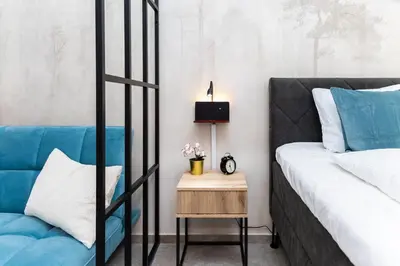 Ein Bett oder Betten in einem Zimmer der Unterkunft Boutique Suite near city centre