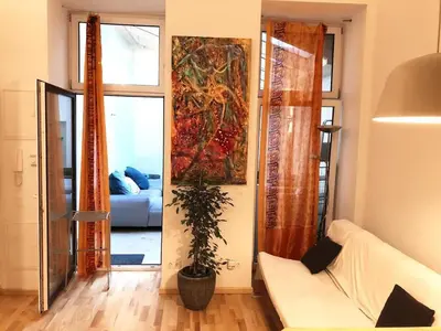 Ein Sitzbereich in der Unterkunft Lofty Garden Stay