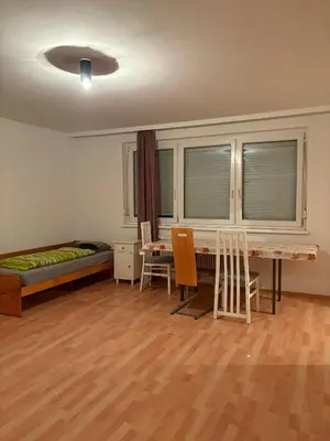 Ein Bett oder Betten in einem Zimmer der Unterkunft Hostel am Brunnenmarkt