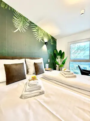 Ein Bett oder Betten in einem Zimmer der Unterkunft Apartment mit Balkon und Parkplatz