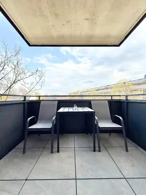 Ein Balkon oder eine Terrasse in der Unterkunft Apartment mit Balkon und Parkplatz