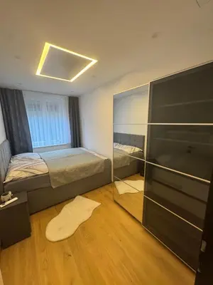 Ein Bett oder Betten in einem Zimmer der Unterkunft Black and white style apartment in Vienna
