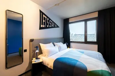 Ein Bett oder Betten in einem Zimmer der Unterkunft The Social Hub Vienna Extended Stay