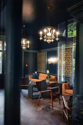 Ein Sitzbereich in der Unterkunft hideauts hotels Villa R