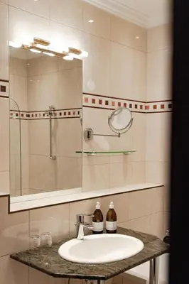Ein Badezimmer in der Unterkunft hideauts hotels Villa R