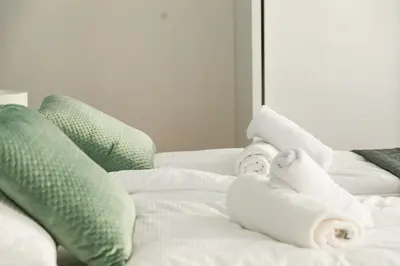 Ein Bett oder Betten in einem Zimmer der Unterkunft New Design Apartment 9