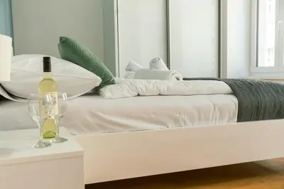 Ein Bett oder Betten in einem Zimmer der Unterkunft New Design Apartment 9