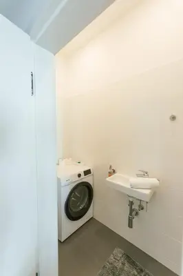 Ein Badezimmer in der Unterkunft New Design Apartment 9