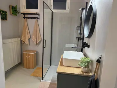 Ein Badezimmer in der Unterkunft Bright apartment with parking near Schönbrunn