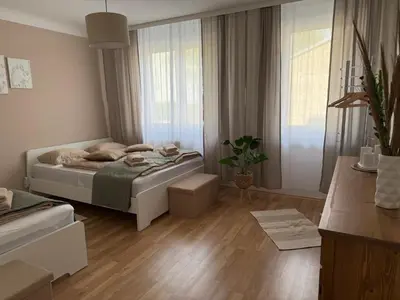 Ein Bett oder Betten in einem Zimmer der Unterkunft Bright apartment with parking near Schönbrunn