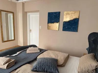 Ein Bett oder Betten in einem Zimmer der Unterkunft Bright apartment with parking near Schönbrunn