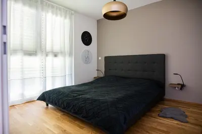 Ein Bett oder Betten in einem Zimmer der Unterkunft Urban Nest