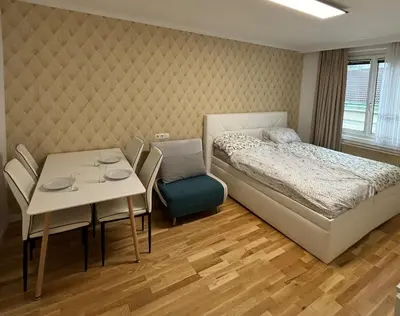 Ein Bett oder Betten in einem Zimmer der Unterkunft Extravagante Serviced-Wohnung