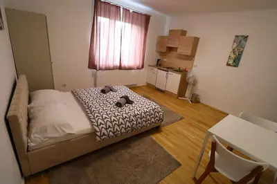 Ein Bett oder Betten in einem Zimmer der Unterkunft Diamond Home Apartments