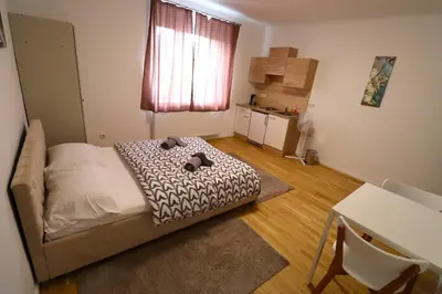 Ein Bett oder Betten in einem Zimmer der Unterkunft Diamond Home Apartments
