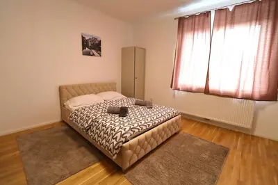Ein Bett oder Betten in einem Zimmer der Unterkunft Diamond Home Apartments
