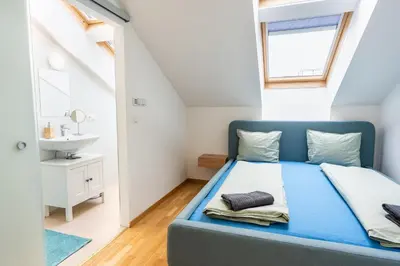 Ein Bett oder Betten in einem Zimmer der Unterkunft Rooftop Penthouse