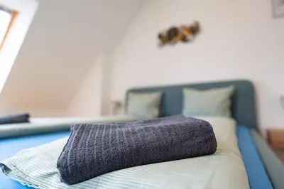 Ein Bett oder Betten in einem Zimmer der Unterkunft Rooftop Penthouse