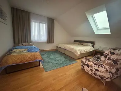 Ein Bett oder Betten in einem Zimmer der Unterkunft Gemütliche Unterkunft in Pottendorf