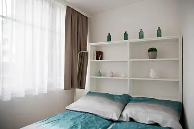 Ein Bett oder Betten in einem Zimmer der Unterkunft Stylish 1-Bedroom Apartment by Rochusmarkt Walk to the City Center