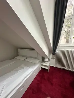 Ein Bett oder Betten in einem Zimmer der Unterkunft Sissi Suite in center of Vienna