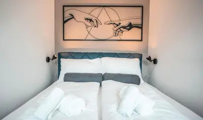Ein Bett oder Betten in einem Zimmer der Unterkunft Wohnbude Hauptbahnhof