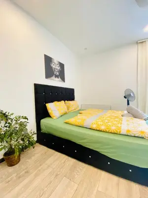 Ein Bett oder Betten in einem Zimmer der Unterkunft Modern 1BR Stay Comfort for 3 in Central Vienna