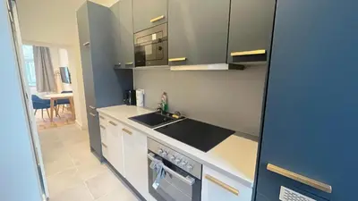 Küche/Küchenzeile in der Unterkunft Apartment Hauptbahnhof Blue - Kingsize Bed