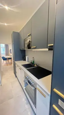 Küche/Küchenzeile in der Unterkunft Apartment Hauptbahnhof Blue - Kingsize Bed