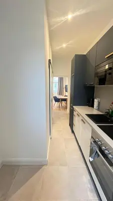 Küche/Küchenzeile in der Unterkunft Apartment Hauptbahnhof Blue - Kingsize Bed