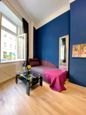 Ein Bett oder Betten in einem Zimmer der Unterkunft Elegant 1-Bedroom Apartment Near Danube River