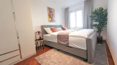 Ein Bett oder Betten in einem Zimmer der Unterkunft Serviced Apartment Neuwaldegg