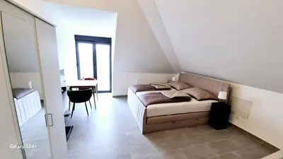 Ein Bett oder Betten in einem Zimmer der Unterkunft Moderne Apartments mit Klima, perfekter Anbindung ins Zentrum und kostenlose Parkplätze!