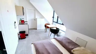 Ein Bett oder Betten in einem Zimmer der Unterkunft Moderne Apartments mit Klima, perfekter Anbindung ins Zentrum und kostenlose Parkplätze!