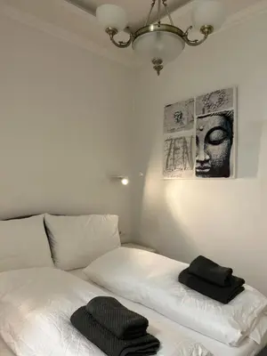 Ein Bett oder Betten in einem Zimmer der Unterkunft MY Home in Vienna