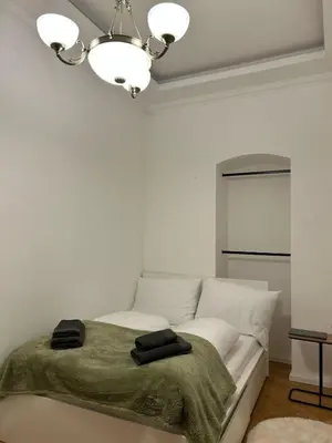 Ein Bett oder Betten in einem Zimmer der Unterkunft MY Home in Vienna