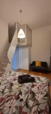 Ein Bett oder Betten in einem Zimmer der Unterkunft Small and cozy flat