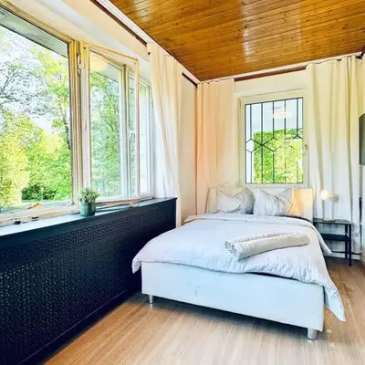Affordable Rooms in a Villa with Garden near Danube