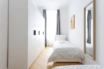 Ein Bett oder Betten in einem Zimmer der Unterkunft Central Stylish Apartment near Opera