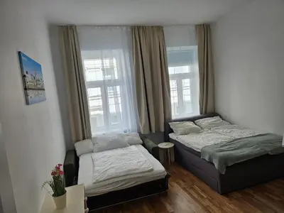 Ein Bett oder Betten in einem Zimmer der Unterkunft Studioapartment Wien West - 15 minutes to Stephansdom and Schönbrunn