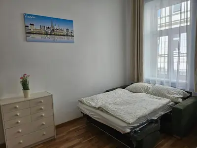 Ein Bett oder Betten in einem Zimmer der Unterkunft Studioapartment Wien West - 15 minutes to Stephansdom and Schönbrunn